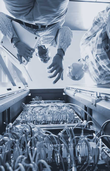 it-consultant-and-client-looking-at-a-server